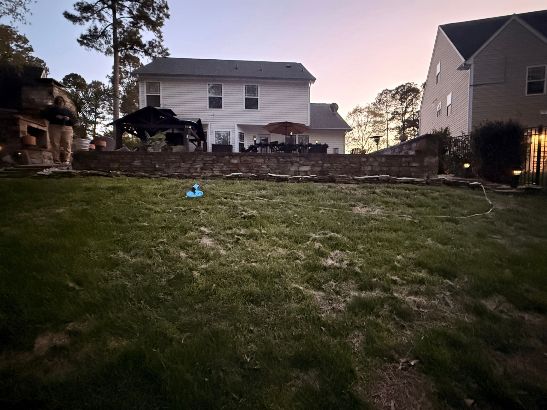 Before — sloped backyard